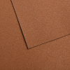 Rust-colored textured metal panels overlapping, with a diagonal seam where they meet.