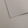 Two overlapping beige textured sheets of paper with subtle shadows.