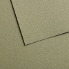 Two overlapping beige textured panels on a rough surface, showing layered geometric shapes.