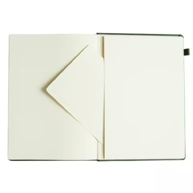 Open notebook with blank cream pages, left page folded into a diagonal corner shape on top of the page edge.
