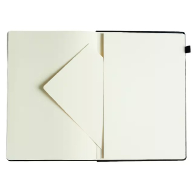 Open notebook with cream pages and a folded corner page here and there, showing a page folded inward in the left half.]
