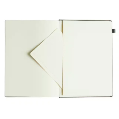Open notebook with blank cream pages and a triangular folded corner on the left page.