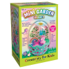 Product packaging for a 'Mini Garden Unicorn' craft kit for kids, showing a colorful egg-shaped garden scene with unicorn figures and decorative blocks.