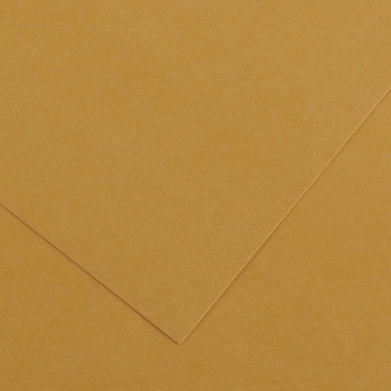 Close-up of overlapping tan kraft paper sheets with a folded corner.