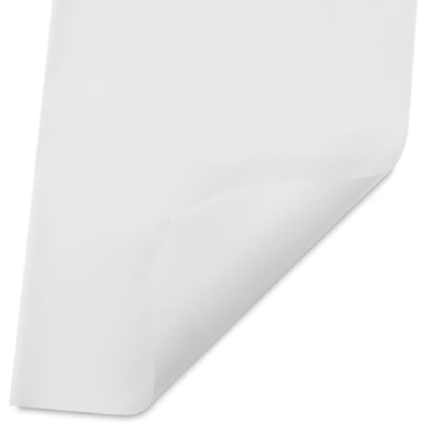 Close-up of a white paper napkin's folded corner with a subtle crease