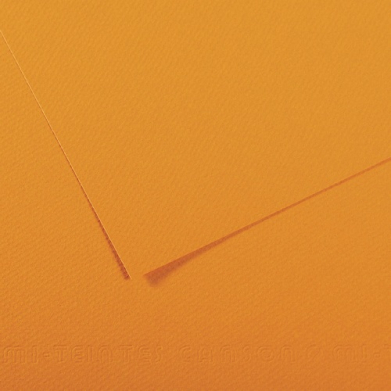 Close-up of textured orange paper with diagonal fold lines creating abstract shapes.