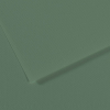 Close-up of green textured material with a diagonal seam and overlapping corner, like leather or heavy paper texture used as a background.