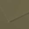 Close-up of brown kraft paper with a diagonal fold and subtle textured surface.