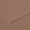 Close-up of brown cardboard sheets with a textured surface and a folded edge.