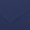 Close-up of navy blue paper with a diagonal fold creating an overlapping corner shape, like a folded card edge.