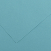 Close-up of teal blue textured paper with a diagonal fold creating a corner.