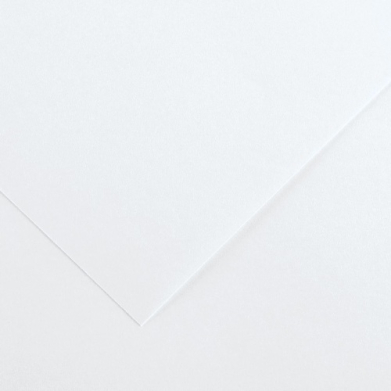 Close-up of white folded paper forming an envelope-like corner with diagonal crease.