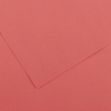 Close-up of red/pink paper with folded edges creating diagonal creases.