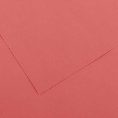 Close-up of red/pink paper with folded edges creating diagonal creases.