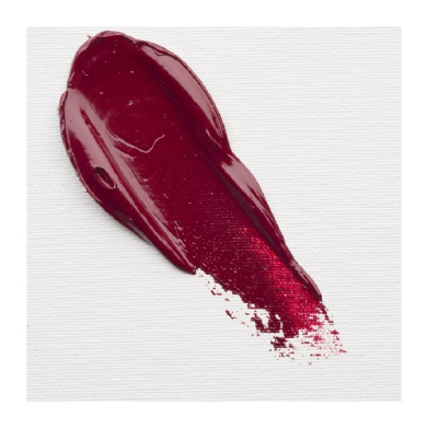 Diagonal swipe of deep red lipstick on a white textured background, showing glossy finish and pigment spill at the tip.